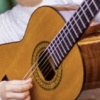 Abb. Gitarre spielen
