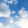 Abb. Die Sonne scheint durch lockere Wolken